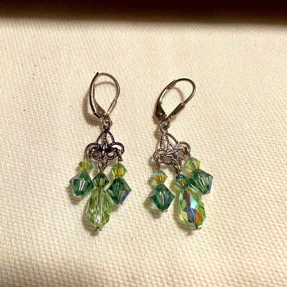 Green iridescent chandelier earring.
